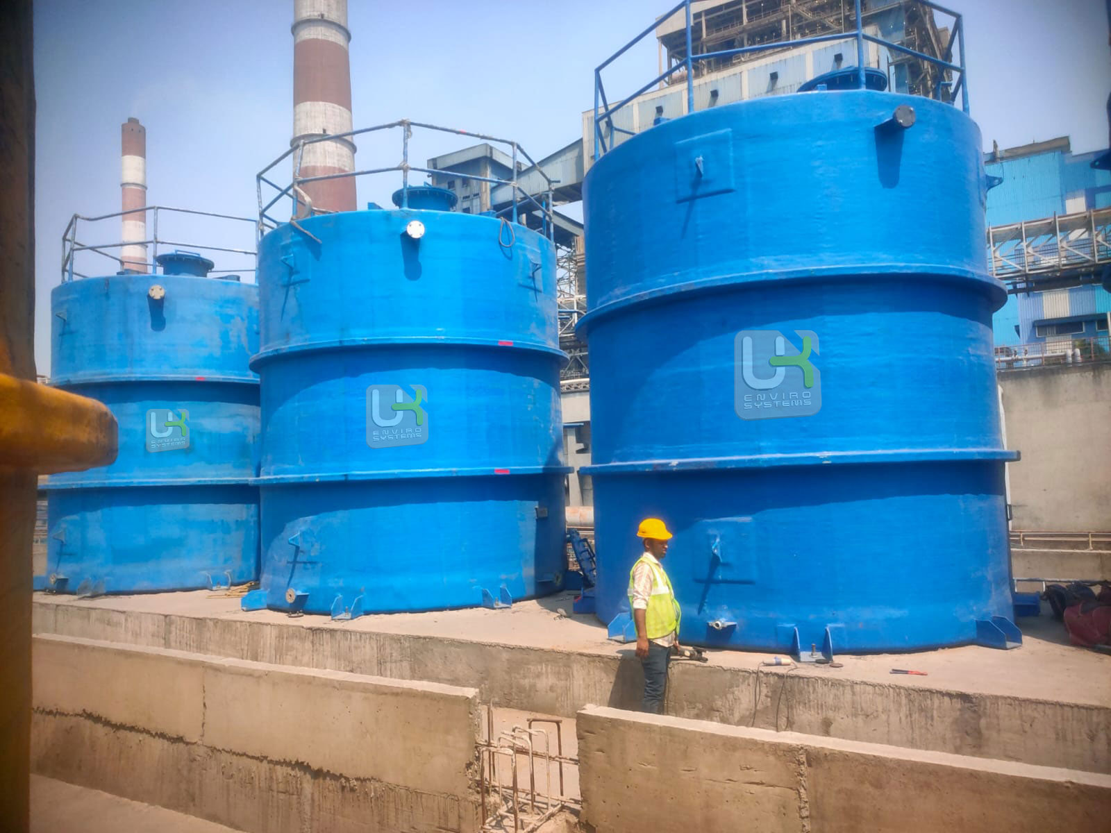 NTPC blue chemical storage tanks installed on-site